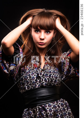 Beautiful red-haired young woman 15408136