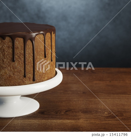 Delicious vegan super chocolate cake on stands 15411796