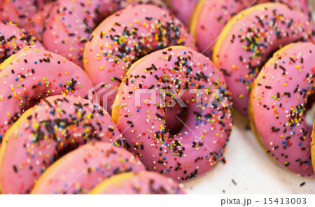 Sweet donuts at shop counters Sweet donuts at shop counters 15413003