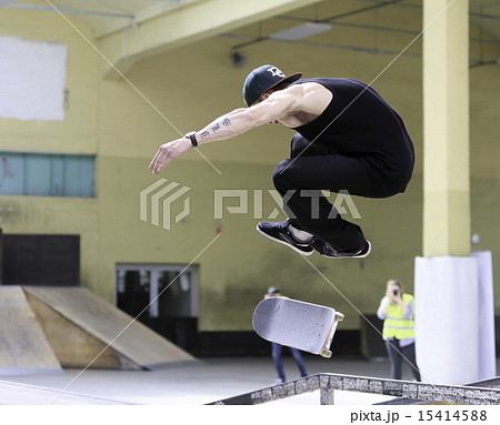 Young skateboarders training in skatepark Young skateboarders training in skatepark 15414588
