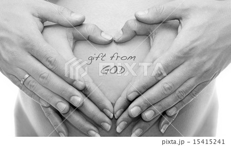 mom with hand on the baby by heart shape symbol 15415241