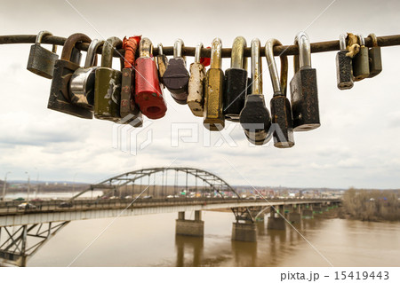 Locked Padlocks and a Bridge Construction Locked Padlocks and a Bridge Construction 15419443