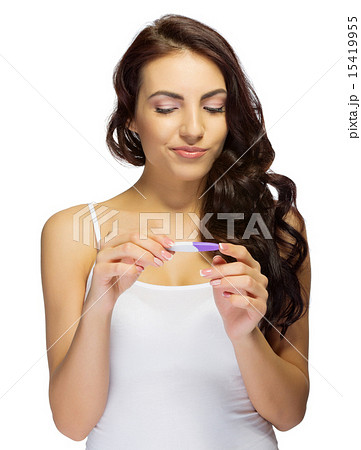 Young girl with pregnancy test 15419955