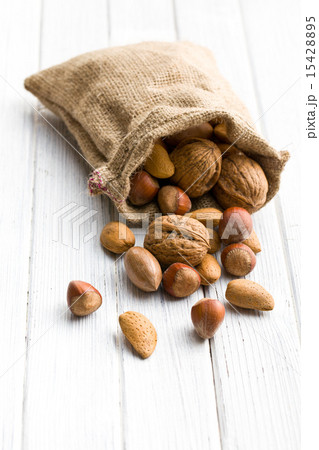 Various nuts in jute bag 15428895
