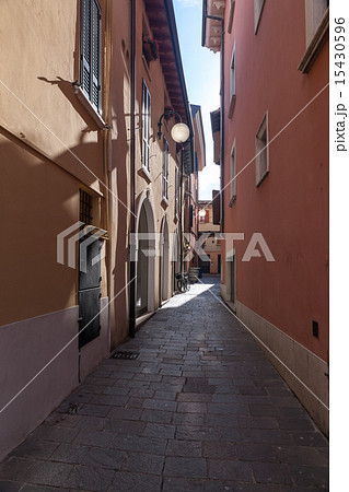 narrow street of the old city in Italy 15430596
