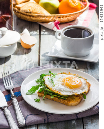 Fried egg on toast, snack, English breakfast Fried egg on toast, snack, English breakfast 15431941