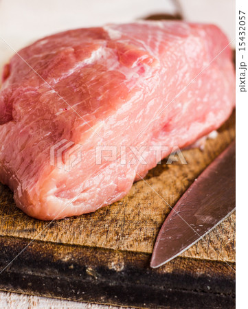 raw meat on a cutting board on a white background 15432057