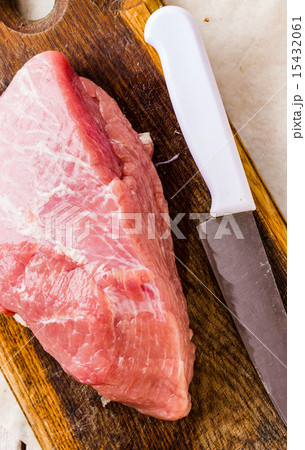raw meat on a cutting board on a white background raw meat on a cutting board on a white background 15432061