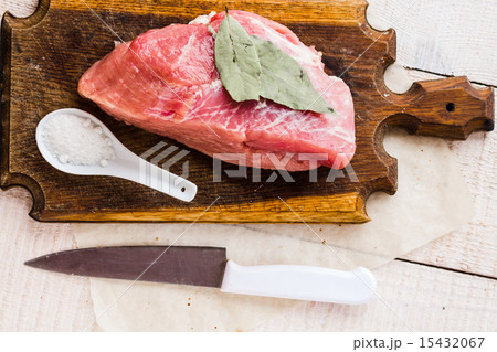 raw meat on a cutting board on a white background 15432067