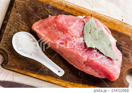 raw meat on a cutting board on a white background 15432068