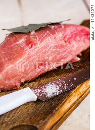 raw meat on a cutting board on a white background raw meat on a cutting board on a white background 15432072
