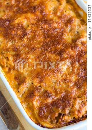 meat lasagna with mushrooms in a white bowl  15432537