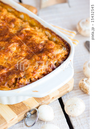 meat lasagna with mushrooms in a white bowl meat lasagna with mushrooms in a white bowl 15432545