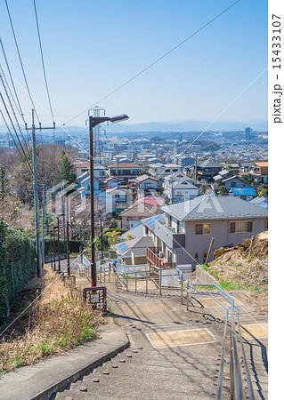 階段から眺める住宅街の写真素材