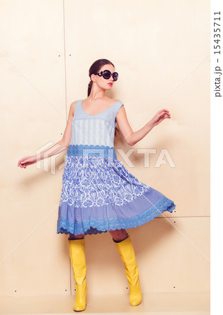 Full body slim woman in blue sundress Full body slim woman in blue sundress 15435711