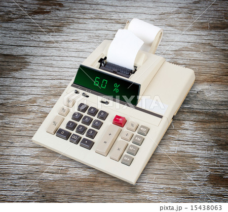 Old calculator showing a percentage - 60 percent Old calculator showing a percentage - 60 percent 15438063