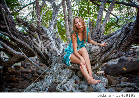 Portrait of beautiful elegant lady  with dress in a green jungle rainforest 15439195