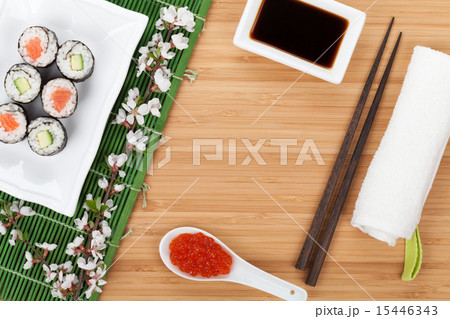 Sushi maki set with fresh sakura branch Sushi maki set with fresh sakura branch 15446343