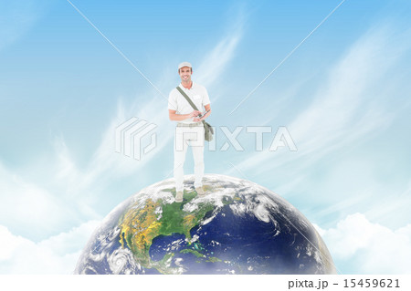 Composite image of happy delivery man using digital tablet Composite image of happy delivery man using digital tablet 15459621