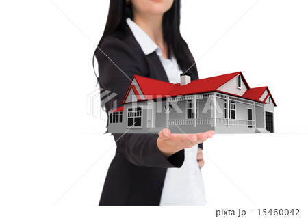 Composite image of pretty businesswoman presenting with hand Composite image of pretty businesswoman presenting with hand 15460042