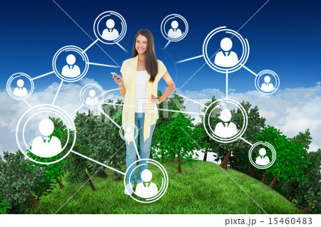 Composite image of happy casual woman sending a text Composite image of happy casual woman sending a text 15460483