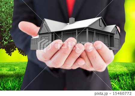 Composite image of businessman presenting with his hands Composite image of businessman presenting with his hands 15460772