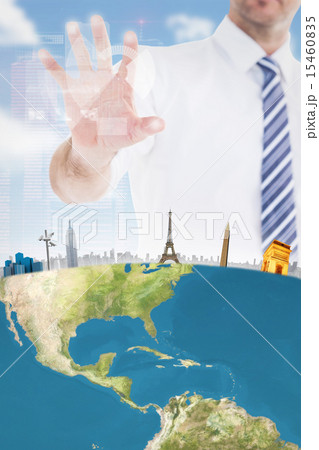 Composite image of handsome businessman gesturing with hand 15460835