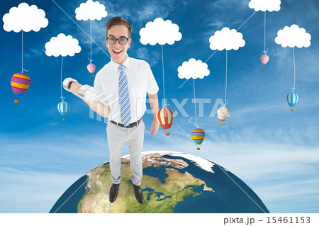 Composite image of geeky happy businessman lifting dumbbell Composite image of geeky happy businessman lifting dumbbell 15461153
