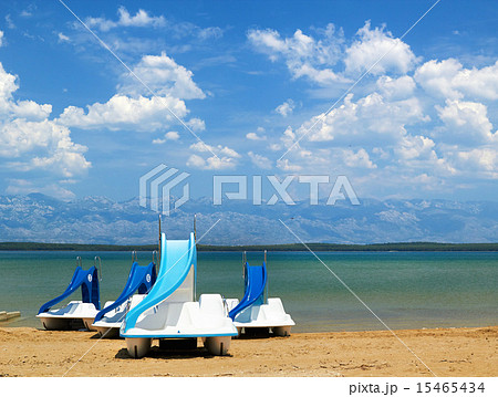 Colorful pedalos on a beautiful tropical beach Colorful pedalos on a beautiful tropical beach 15465434