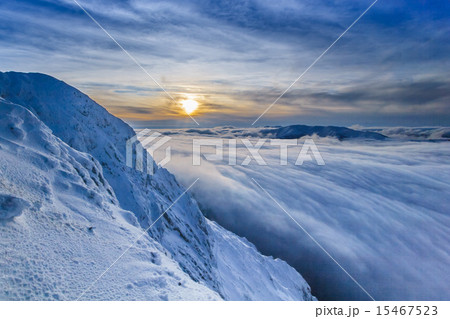 sunset over the mountains and clouds in winter sunset over the mountains and clouds in winter 15467523