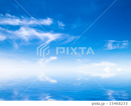 white fluffy clouds with rainbow in the blue sky 15468233