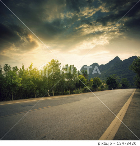 Road and mountain background 15473420