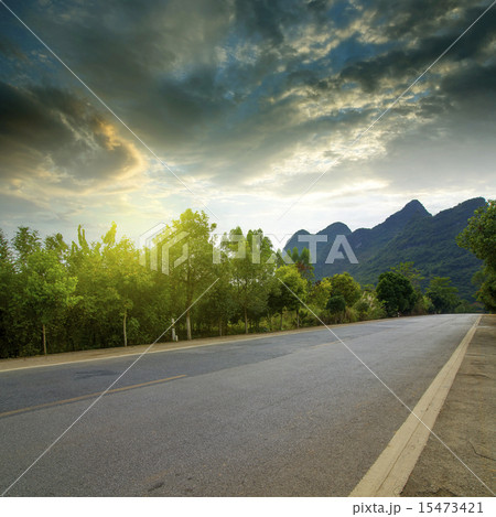Road and mountain background 15473421