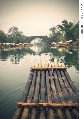 China Guilin Yangshuo bamboo rafting in the beautiful "Yulong River" China Guilin Yangshuo bamboo rafting in the beautiful "Yulong River" 15473542
