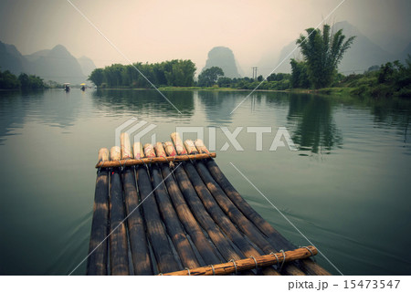 China Guilin Yangshuo bamboo rafting in the beautiful "Yulong River" China Guilin Yangshuo bamboo rafting in the beautiful "Yulong River" 15473547