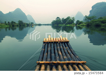 China Guilin Yangshuo bamboo rafting in the beautiful "Yulong River" 15473564