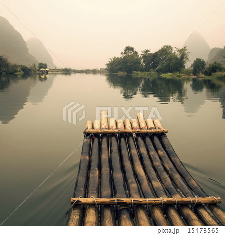 China Guilin Yangshuo bamboo rafting in the beautiful "Yulong River" 15473565