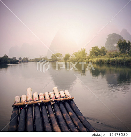 China Guilin Yangshuo bamboo rafting in the beautiful "Yulong River" China Guilin Yangshuo bamboo rafting in the beautiful "Yulong River" 15473589