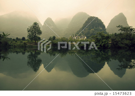China Guilin Yangshuo bamboo rafting in the beautiful "Yulong River" China Guilin Yangshuo bamboo rafting in the beautiful "Yulong River" 15473623