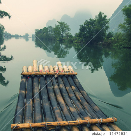 China Guilin Yangshuo bamboo rafting in the beautiful "Yulong River" China Guilin Yangshuo bamboo rafting in the beautiful "Yulong River" 15473634