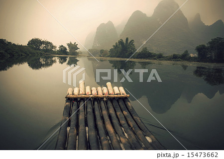 China Guilin Yangshuo bamboo rafting in the beautiful "Yulong River" 15473662