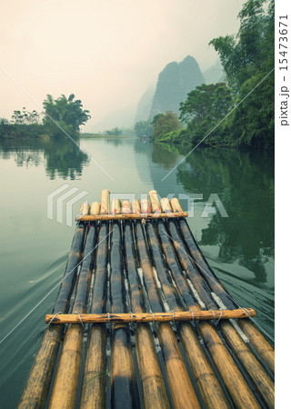 China Guilin Yangshuo bamboo rafting in the beautiful "Yulong River" 15473671