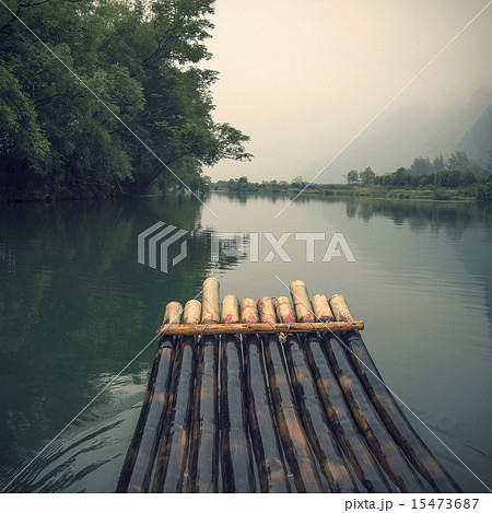 China Guilin Yangshuo bamboo rafting in the beautiful "Yulong River" 15473687