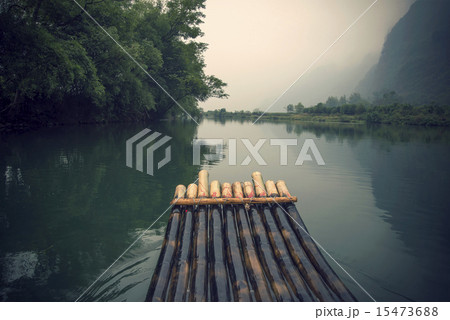 China Guilin Yangshuo bamboo rafting in the beautiful "Yulong River" 15473688