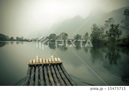 China Guilin Yangshuo bamboo rafting in the beautiful "Yulong River" 15473715