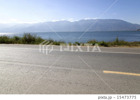 Quiet lakeside road Quiet lakeside road 15473775