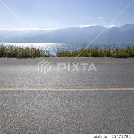 Quiet lakeside road Quiet lakeside road 15473799