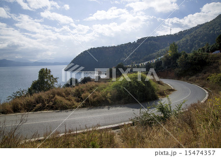 Serene lakes road,china lugu lake Serene lakes road,china lugu lake 15474357