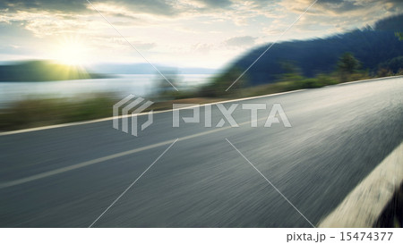 Quiet lakeside road Quiet lakeside road 15474377