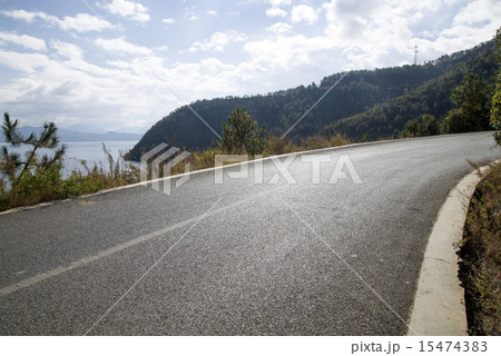 Quiet lakeside road Quiet lakeside road 15474383